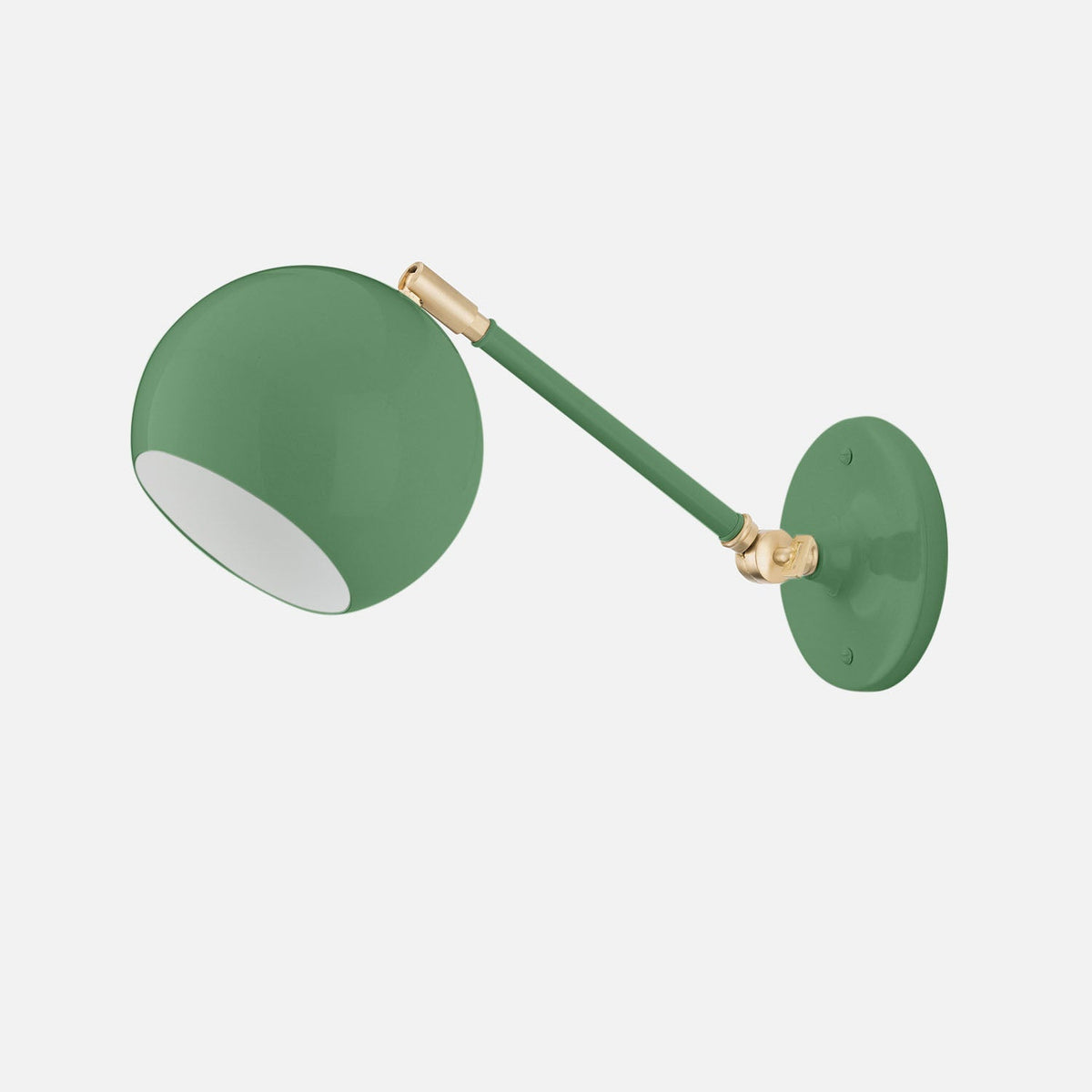 Angled view of the Isaac Wall Sconce showcasing its Juniper-Gloss finish and adjustable brass swivels on a light gray background