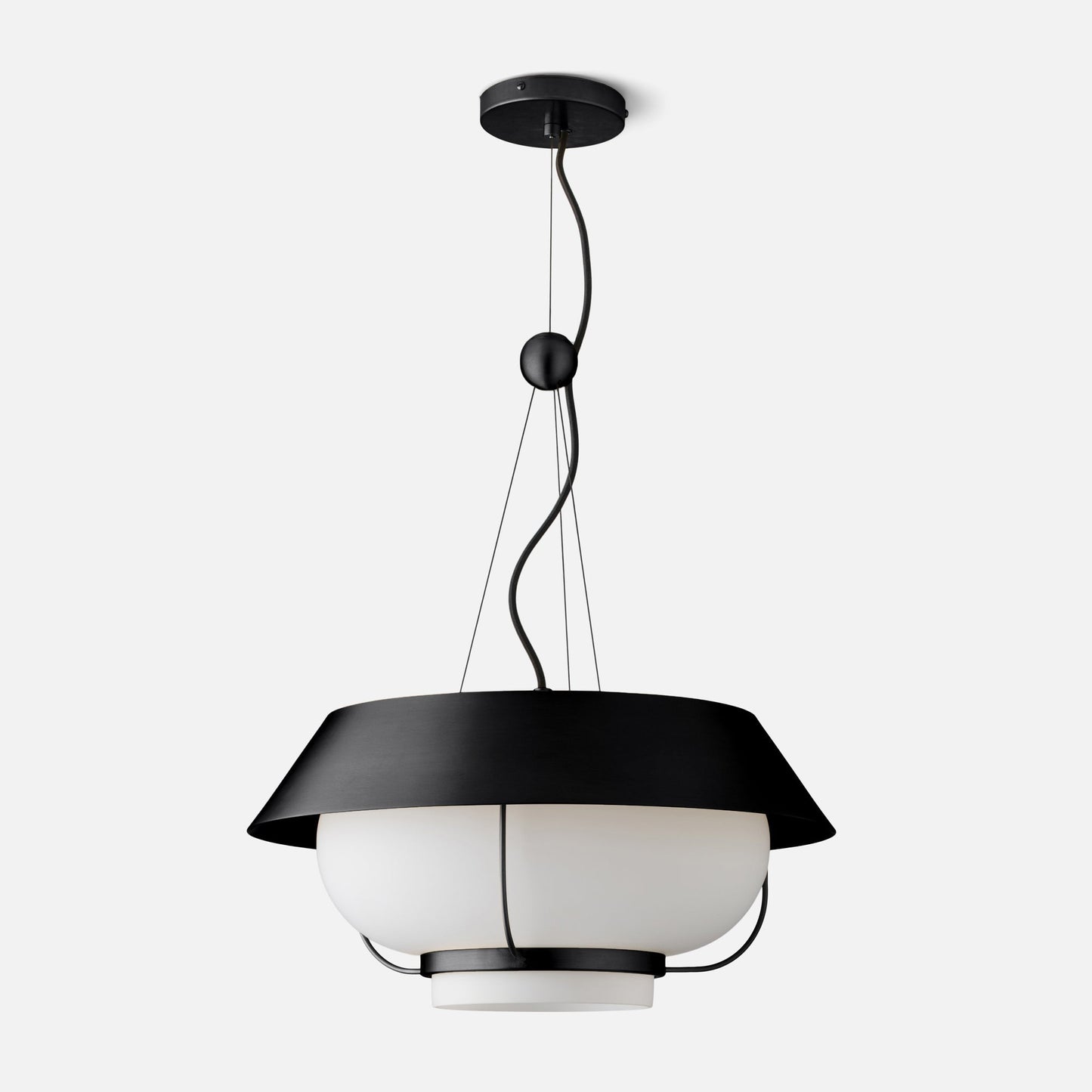 Front view of Alfred pendant showcasing black metal shade, twisted cord and white opal diffuser on light gray background