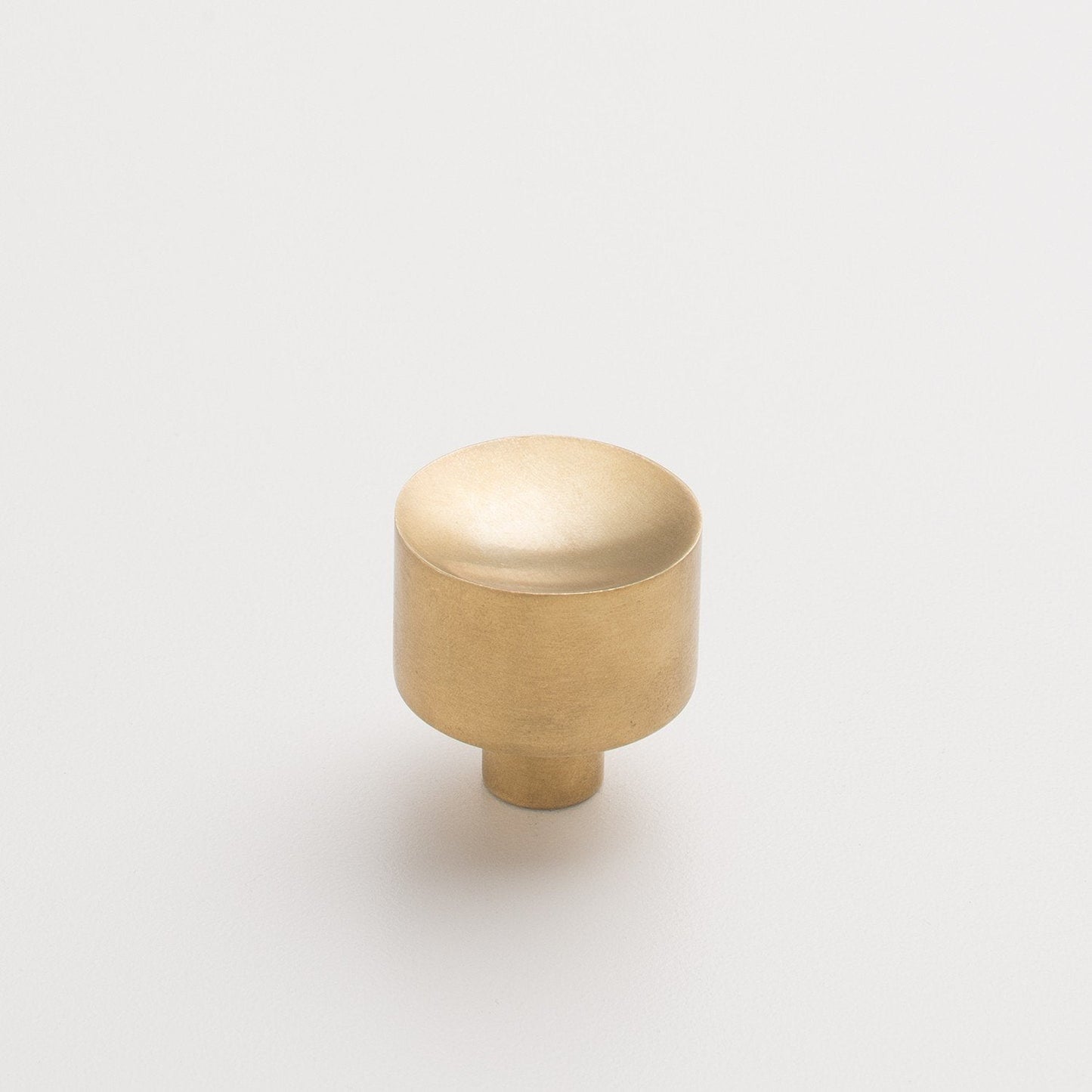 Front view of Mid Century Knob showcasing its rounded cylindrical shape with a white background