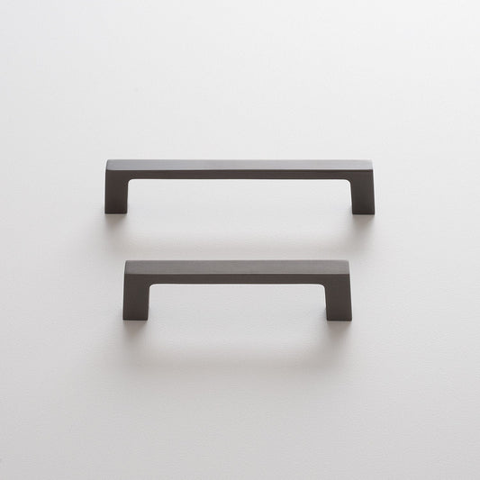 Front view of Greenwood Pull showcasing thin profile and straight bar design in oil-rubbed bronze finish against a white background