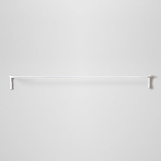 Front view of the white Mara Towel Bar showcasing its sleek wall-mounted design against a light gray background