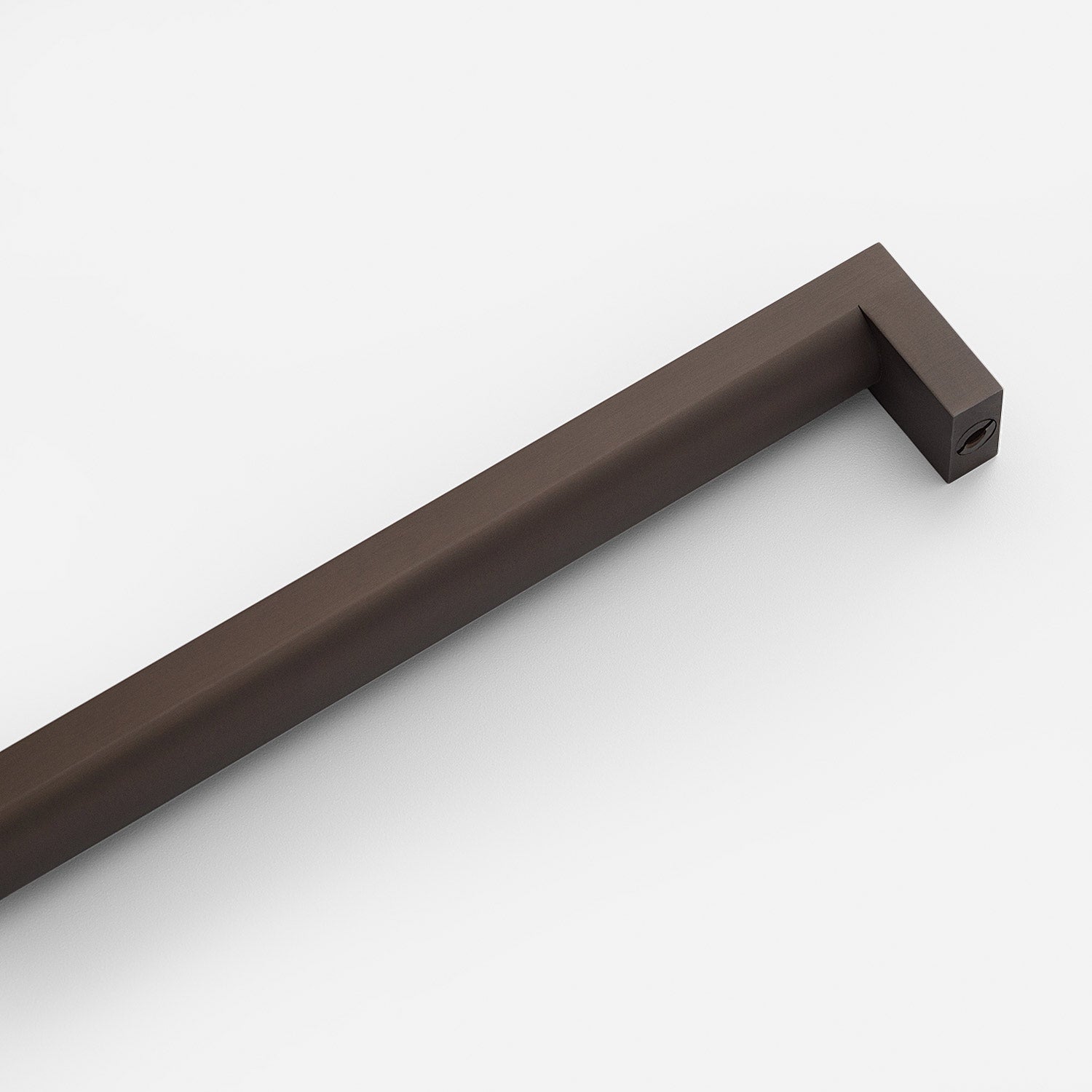 Angled view of Edgecliff Appliance Pull showcasing squared ends and dark finish against a white background