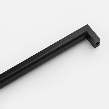 Angled view of Edgecliff appliance pull showcasing a black finish with a white background