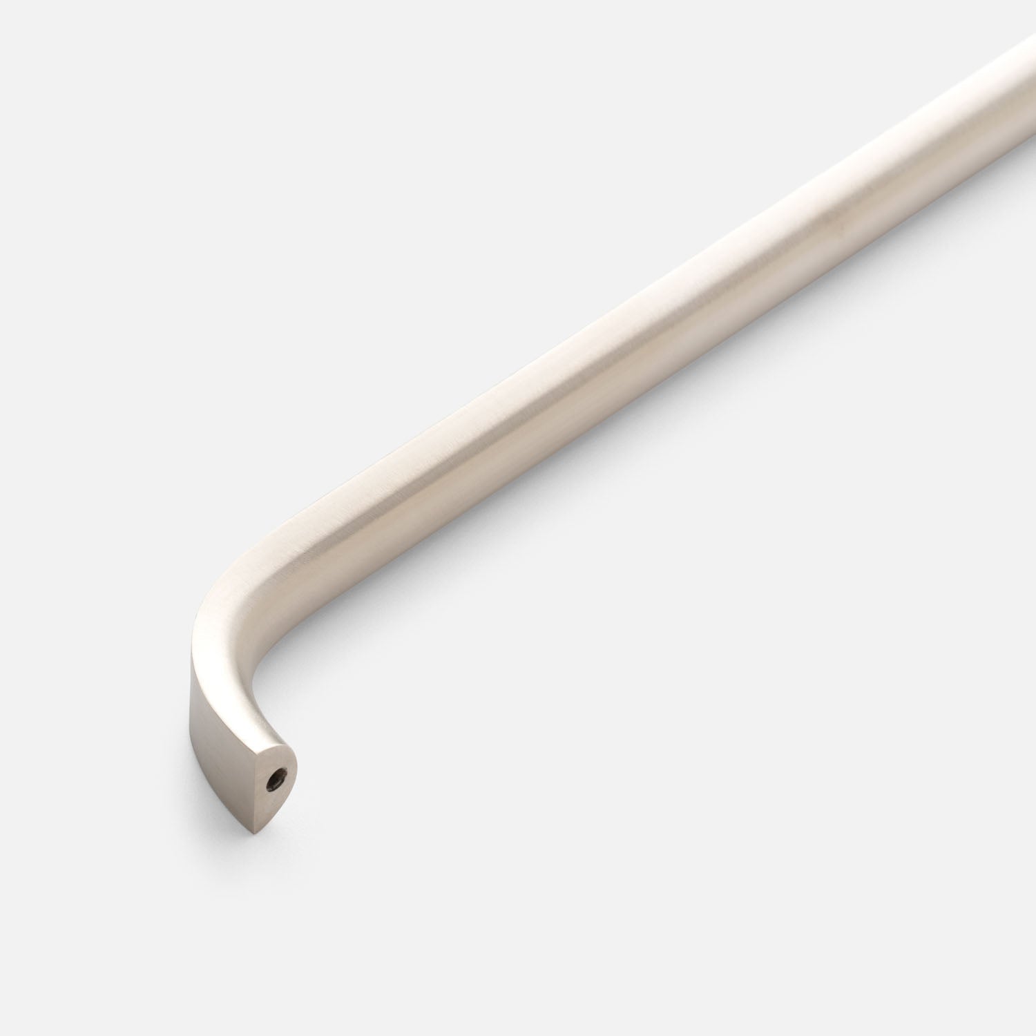 Close-up view of Cascade Pull showcasing its curved cylindrical bar and mounting end with a light gray background
