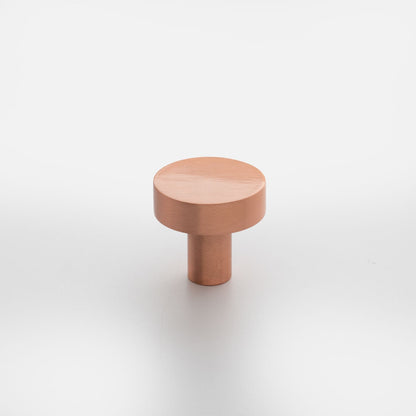 Front view of Edgecliff Knob showcasing its round cylindrical design with a white background