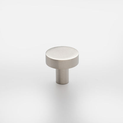 Front view of Edgecliff Knob showcasing its round cylindrical shape on a white background