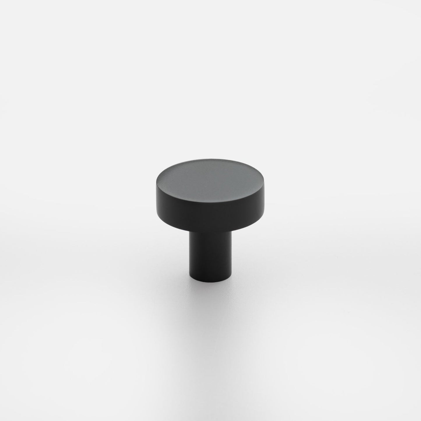 Front three-quarter view of Edgecliff Knob showcasing its black cylindrical design on a white background