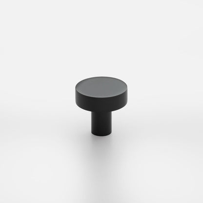Front three-quarter view of Edgecliff Knob showcasing its black cylindrical design on a white background