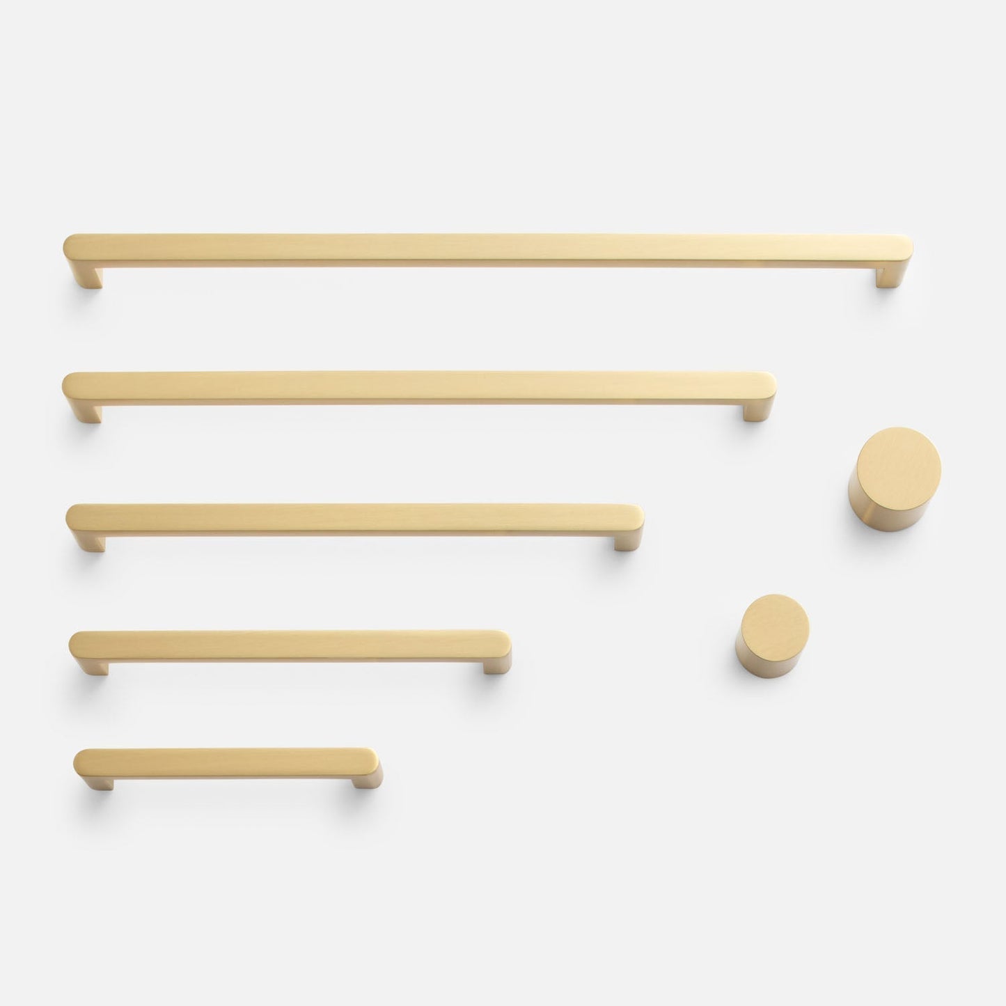 Front view of Cove Pull showcasing multiple bar and round pull sizes on a white background