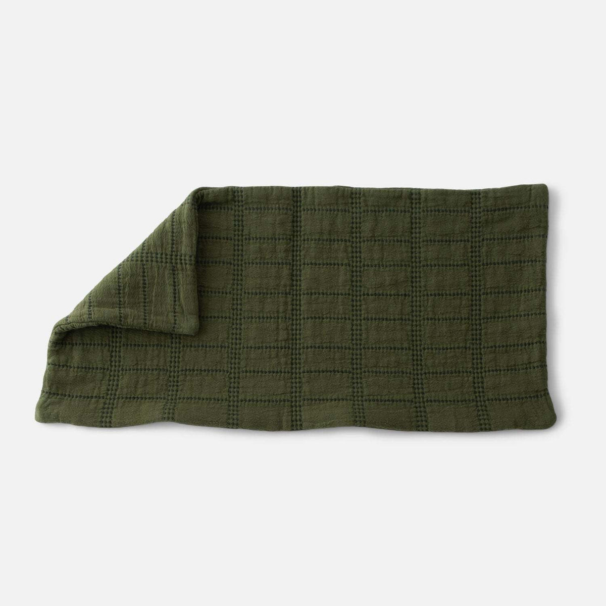 Close-up of Grid Stitch Pillow Cover showcasing olive green grid stitching with a white background