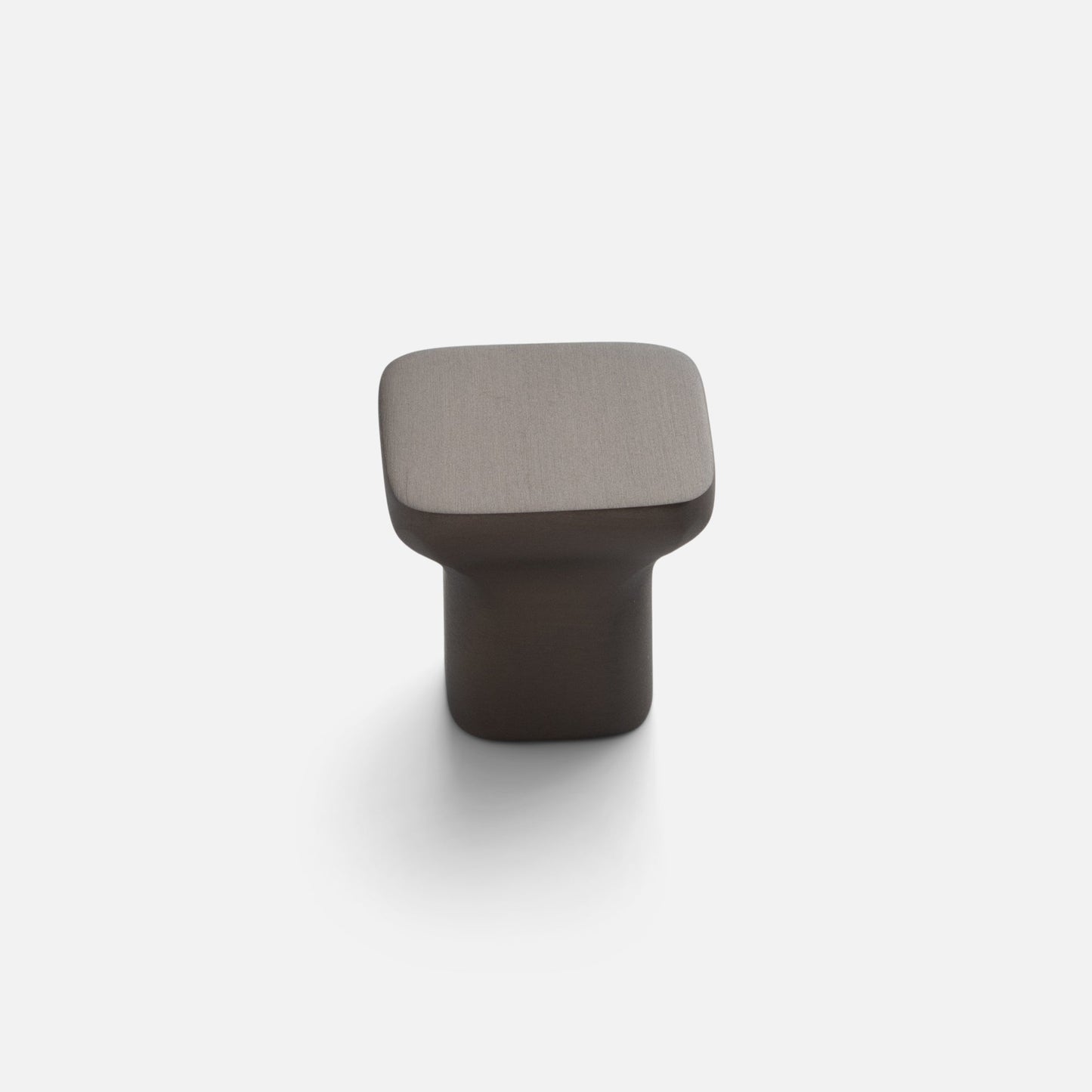 Front view of Cascade knob showcasing its sloping silhouette and oil rubbed bronze finish against a white background