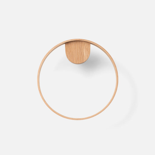 Front view of Oak Towel Ring showcasing a round oak ring and mounting block on a white background