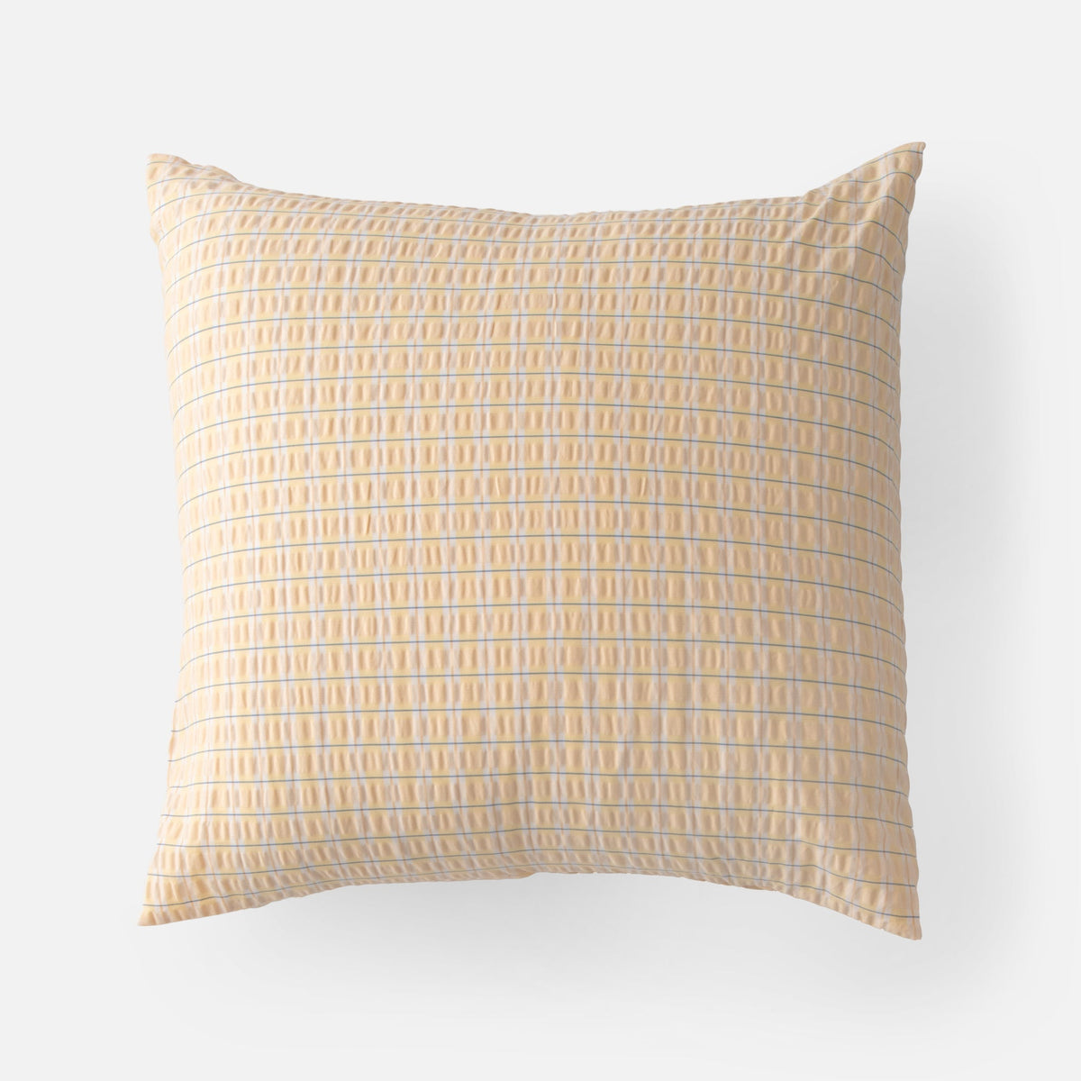 Front view of Seersucker Check Sham showcasing yellow and natural cotton seersucker check pattern on a white background
