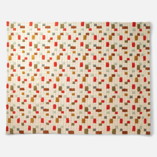 Front view of Pixel Rug showcasing its geometric multicolor pattern and high pile texture on a light gray background