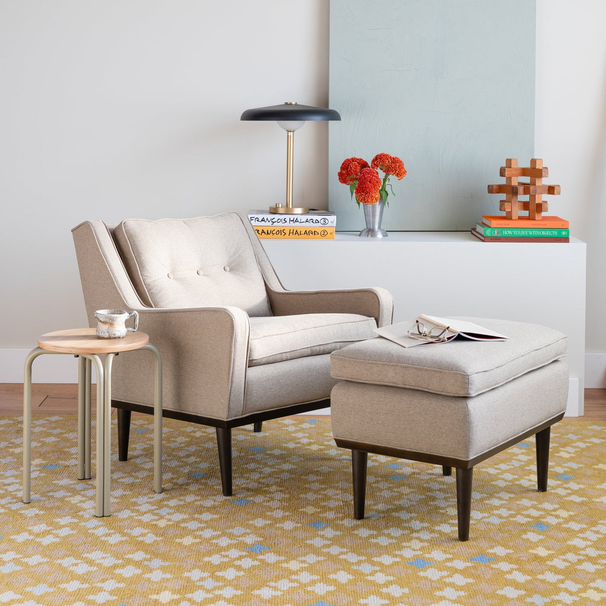 Room view of Sundrop Hand-Knotted Rug showcasing graphic tossed flowers on chartreuse wool in a living room