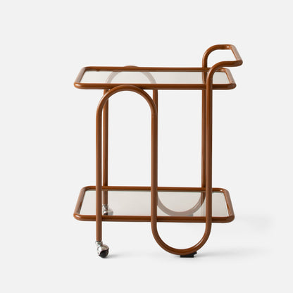 Close-up side view of Lolly Bar Cart showing glossy brown tubular frame, glass shelves, arched supports and casters